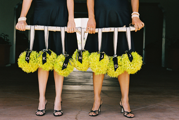 yellow and black wedding pomanders photo by Yvette Roman Photography